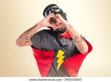 Superhero making a heart with his hands