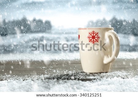 background of white mug and snow 