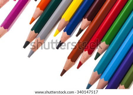 Many color pencil like a rainbow scattered (layout) free top view isolated white.