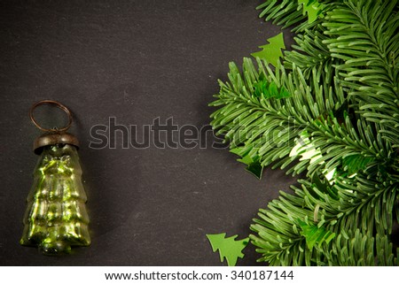 Christmas tree decorations on a black background
