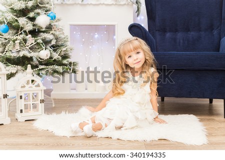Little girl in christmas decorations