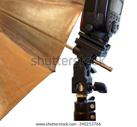 Light stand with flash and umbrella holder close up
