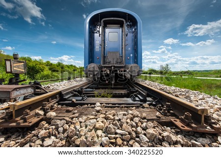 Last wagon of a blue train Royalty-Free Stock Photo #340225520