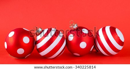 Christmas balls on red background