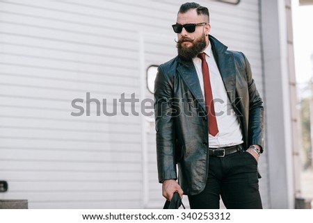 business man checking objects in glasses shirt