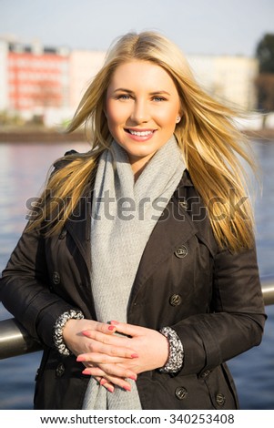 young woman enjoying the autumn sun in Berlin