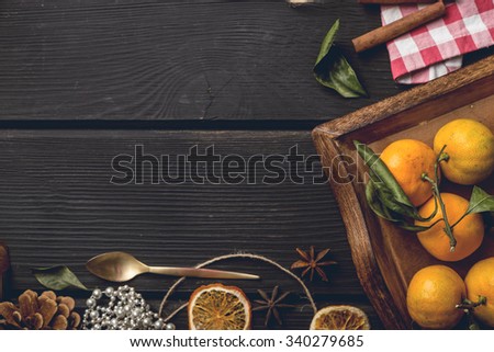 Christmas food frame on black wooden background
