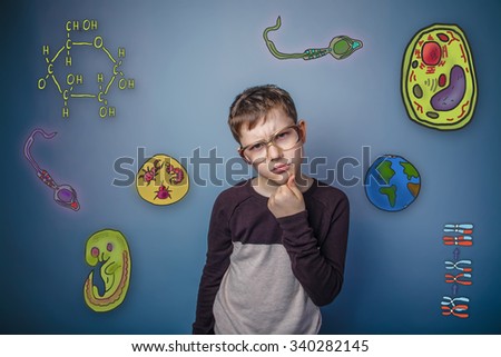 boy with glasses holding his chin ponders icons biology education formation of the embryo cell parasite