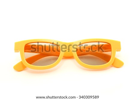 A pair of yellow 3D cinema glasses isolated on a white background