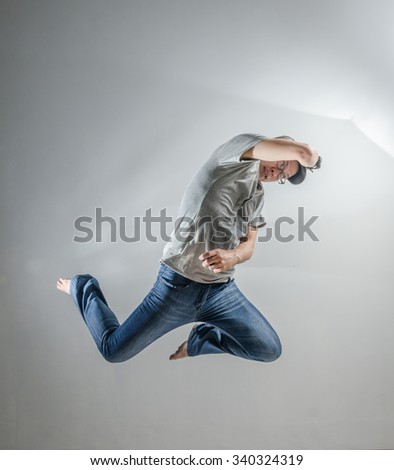 Asian Man Jumping Pose Action