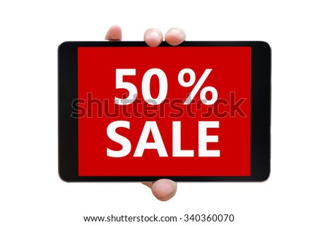 Man hands holding a tablet touch computer pad gadget with words  50% sale the red screen.