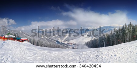 mountain slope at winter time. Dramatic  blue sky