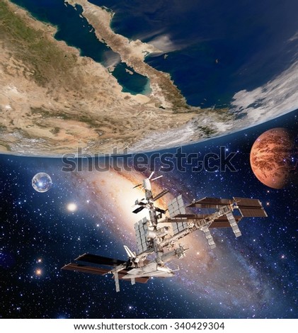Earth satellite solar system international space station iss moon mars planet. Elements of this image furnished by NASA.