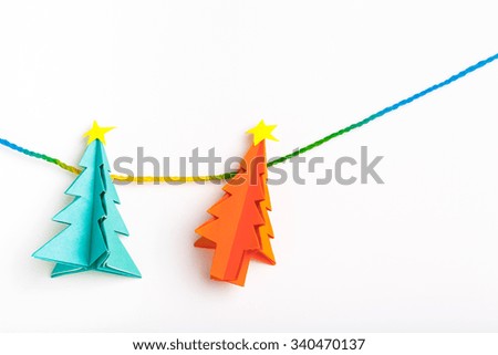 Christmas tree on white isolated origami.