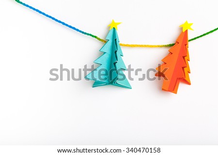 Christmas tree on white isolated origami.