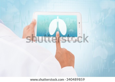 Doctor hand touch screen Lung symbol on a tablet. medical icon