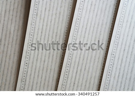 Diagonal vintage punched card textured background