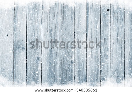 Christmas wooden background with snow