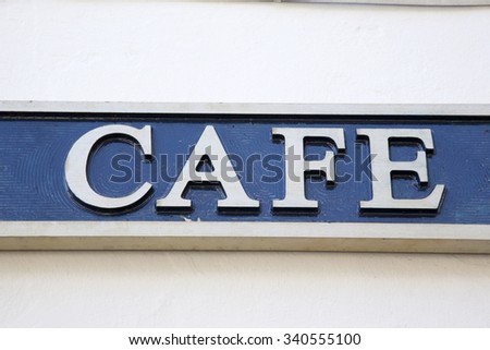 Blue and White Cafe Sign