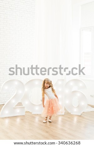 Little girl in christmas decorations
