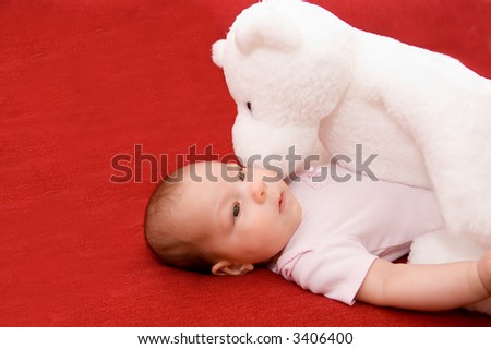 Baby with teddy bear
