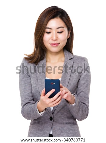 Businesswoman use of the cellphone