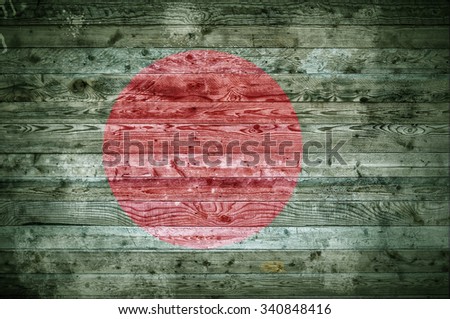 A vignetted background image of the flag of Bangladesh painted onto wooden boards of a wall or floor.