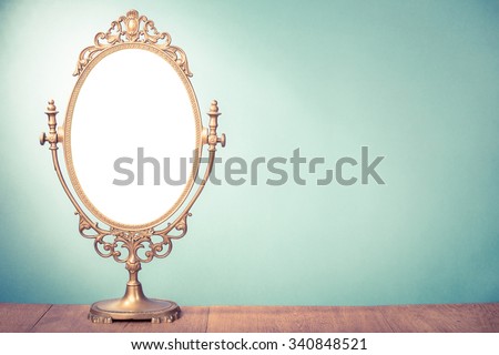Vintage old desk mirror frame. Retro style filtered photo Royalty-Free Stock Photo #340848521