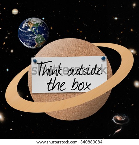 Planet cork board with text Think Outside the Box. Elements of this image furnished by NASA