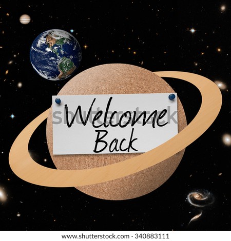 Planet cork board with text welcome back. Elements of this image furnished by NASA