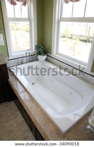 Luxurious bathroom with a modern tub.