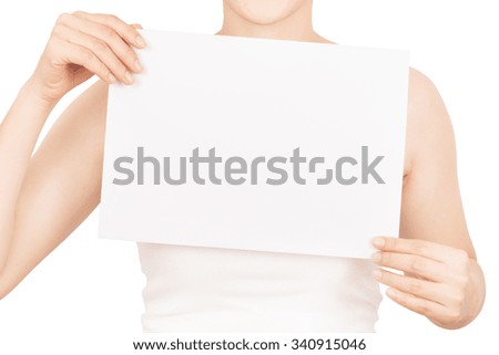 women holding a blank sign