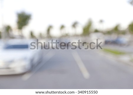 blur image of car park in outdoor parking