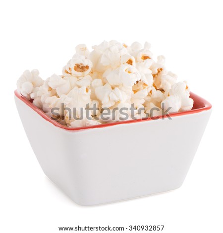 Popcorn in a white bowl on a white background