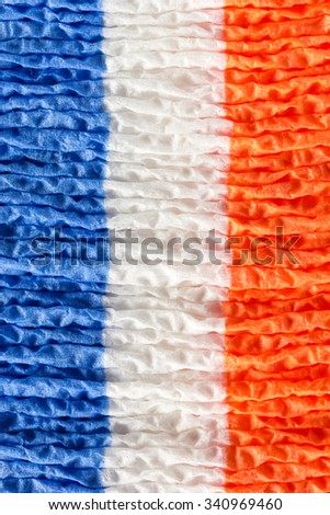 paper napkins painted in the colors of the French flag