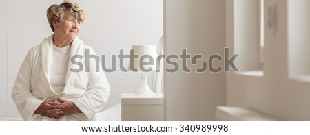 Panorama of smiling female patient of geriatric ward Royalty-Free Stock Photo #340989998