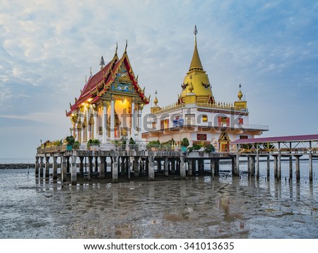 Water temple in Thailand on twilight long speed shutter smooth photo.