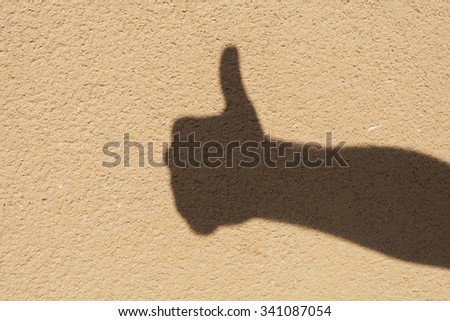 shadow of thumb up