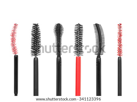 collection of different types of brushes for mascara on isolated white background