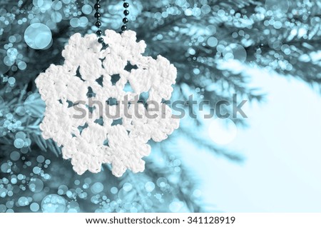 Snowflake associated with threads. Christmas background in retro style.