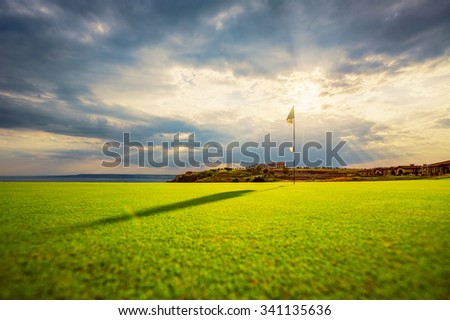Dramatic sunset over the golf course, beautiful golf field