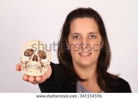 child holding skull