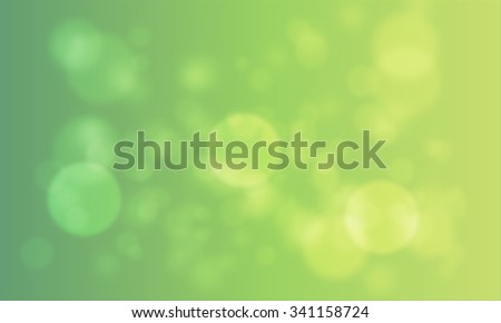 Abstract green bokeh background for Christmas / St Patrick Day holidays