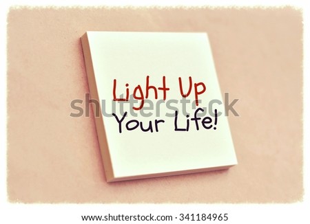 Text light up your life on the short note texture background