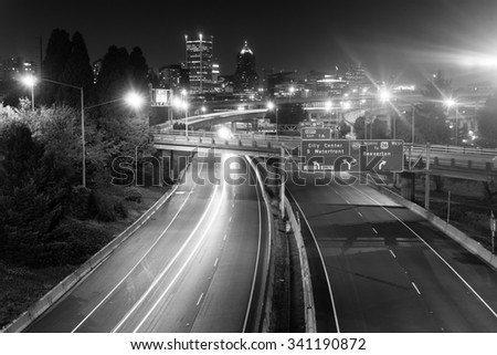 Cars create light trails in a long exposure over I-5 in Portland