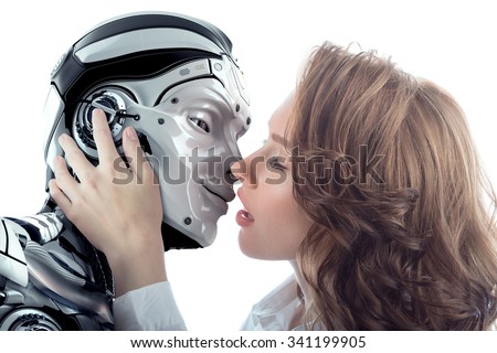 A beautiful woman kissing male robot with love. Two faces very close to each other. Relationship between artificial cyborg and real girl. Closeup portrait of futuristic couple.
