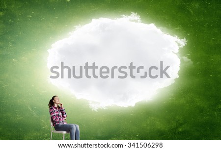 Teenager girl sitting in chair and cloud bubble above her head