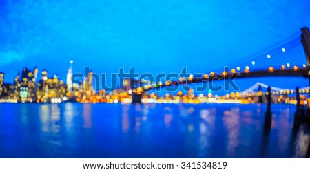 Bokeh of Manhattan and Brooklyn bridge at twilight