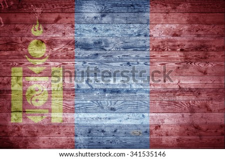 A vignetted background image of the flag of Mongolia painted onto wooden boards of a wall or floor.