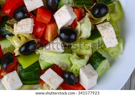 Freshly maked Greek salad with olive, cheese and vegetables